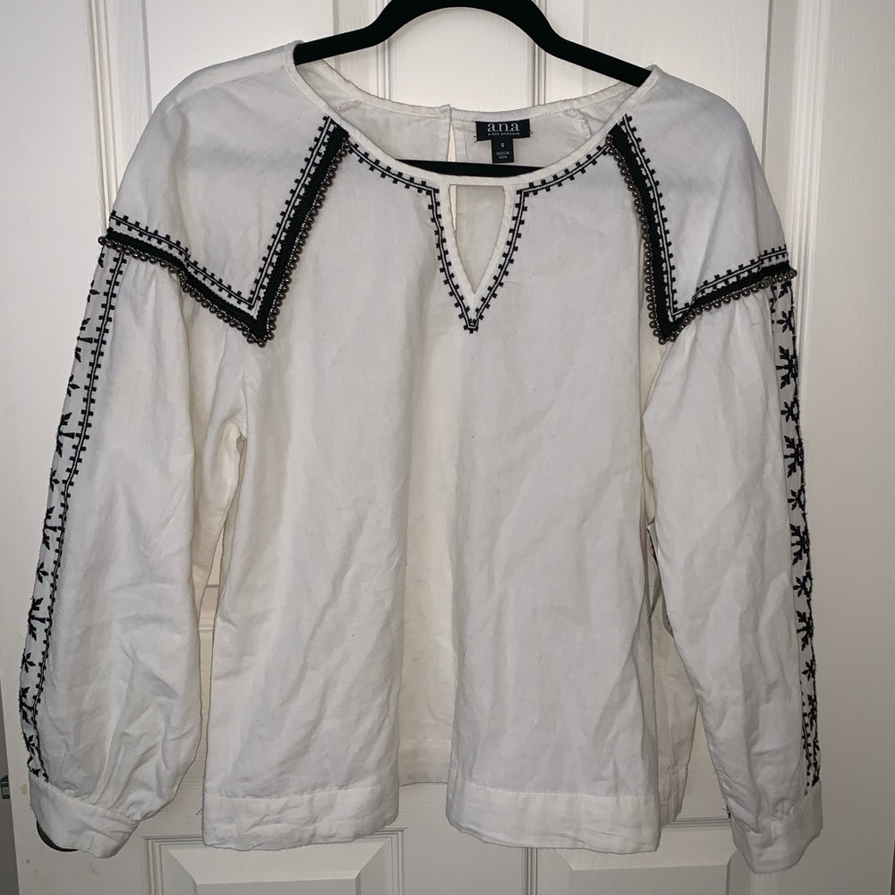 Long sleeved cream shirt